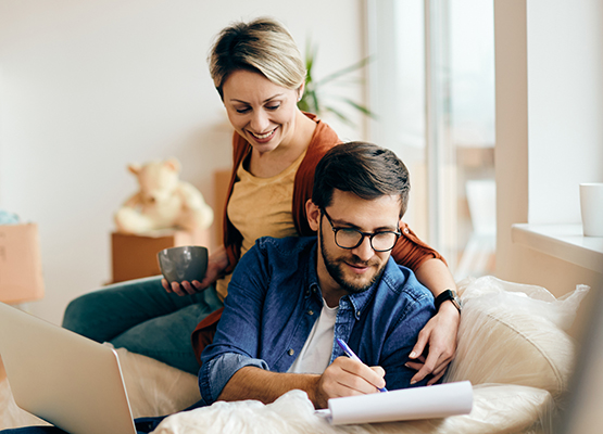 two people with a laptop