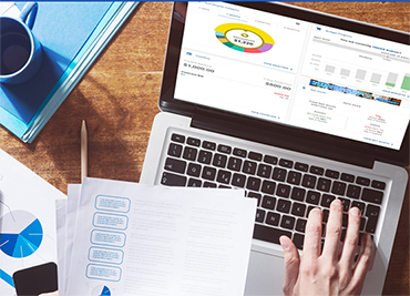 laptop with hand on keyboard