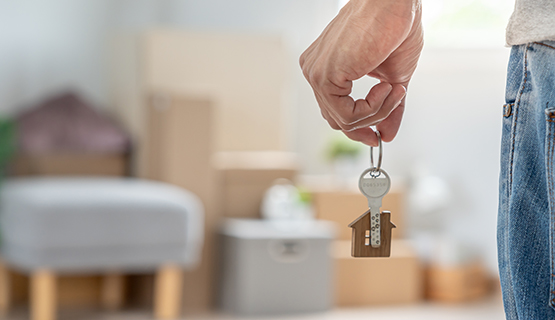 image of hand holding keys